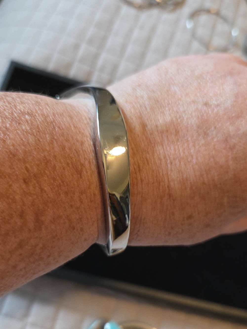 Lia Sophia Polished Silver-Tone Bangle Bracelet With Elastic